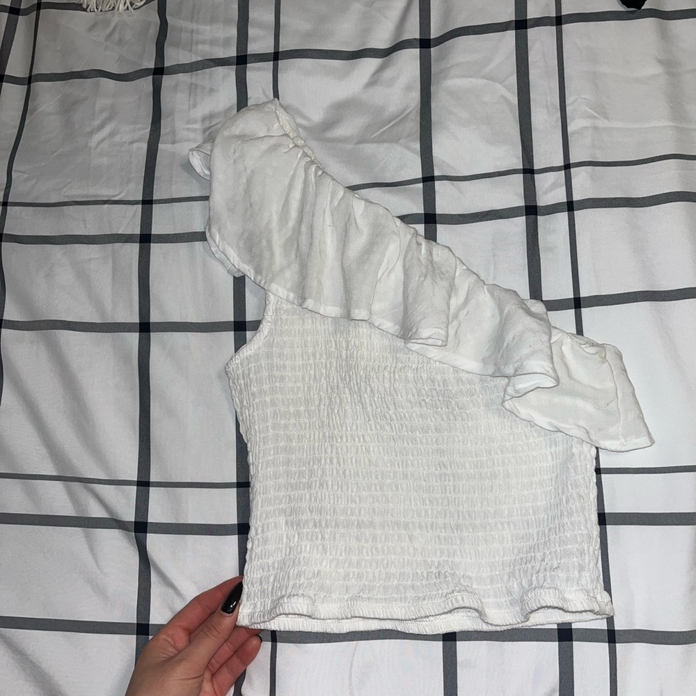 White cropped one shoulder top